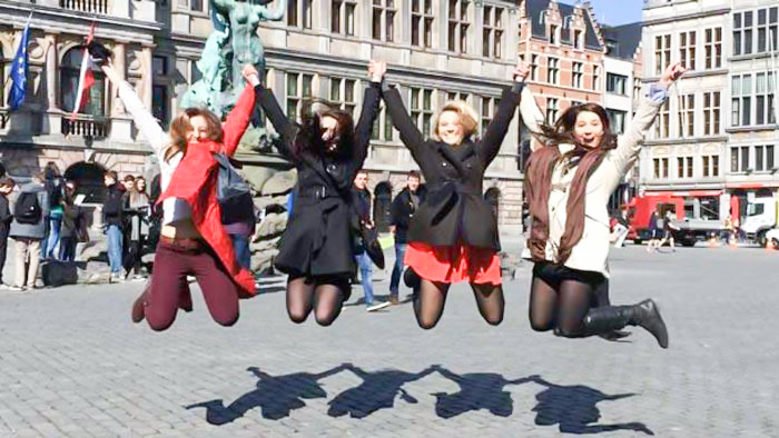 Study abroad students jumping