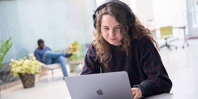 Student studying on a computer.
