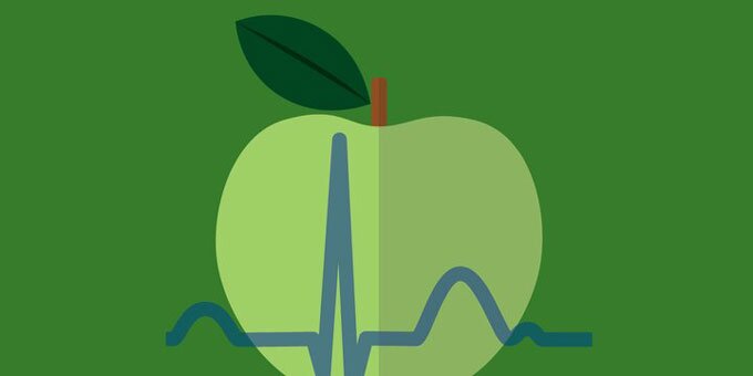 Green apple with heartbeat line