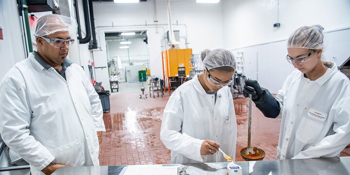 Undergraduate students working in lab.