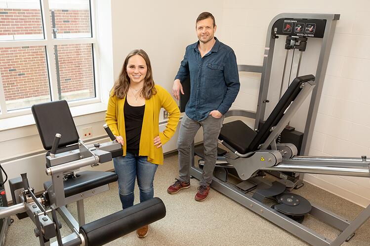 Researchers with exercise equipment