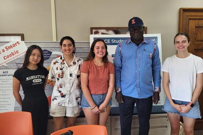 Interns with Aliou Faye, Director of the Regional Center of Excellence on Dry Cereals and Associated Crops (CERAAS).